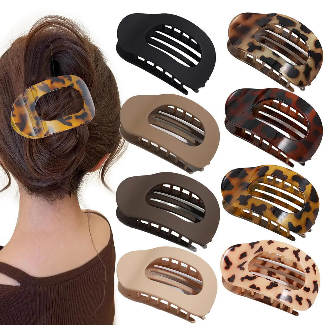 Women's matte oval flat hair claw clip for secure buns & ponytails.