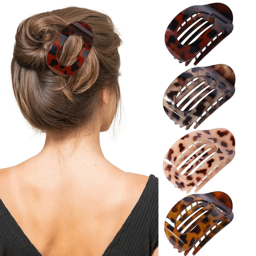 Modern women's matte oval hair claw clip, perfect for fashion styles.