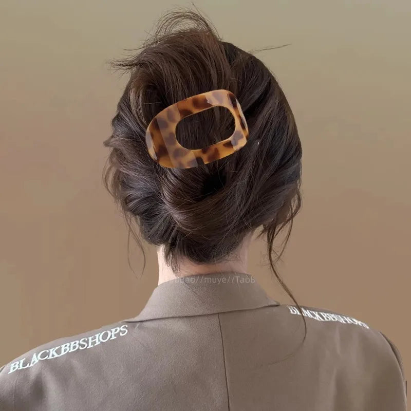Everyday women's matte oval hair accessory, strong grip for buns.