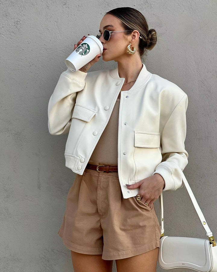 Casual women's bomber jacket, cropped design, great for fall fashion and everyday style.