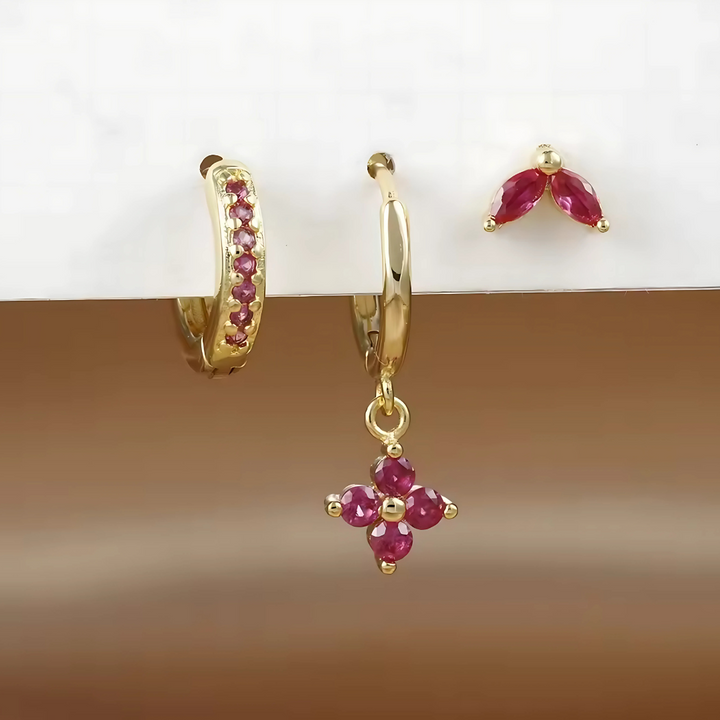 Comfortable women's minimalist piercing set. Hypoallergenic studs & hoops designed for sensitive ears, all-day wear.