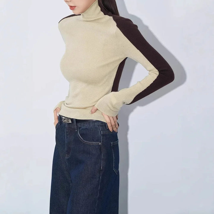 Modern women's mock neck top with unique asymmetric design & striking contrast long sleeves for versatile fashion.