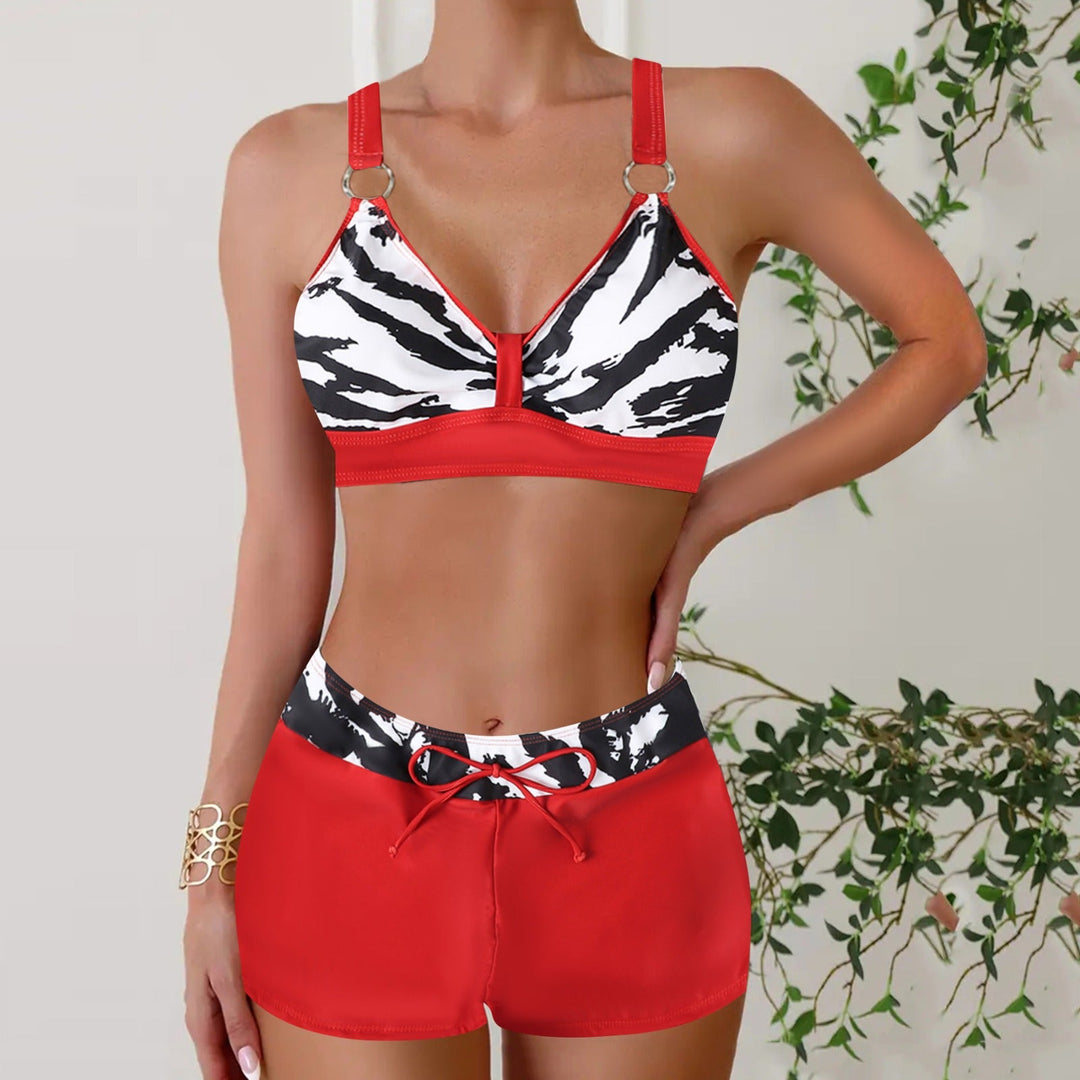 Classic nautical striped women's two-piece swimwear. Flattering bikini set for summer, beach, or vacation wear.