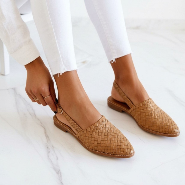 Comfortable women's slip-on loafers with cushioning. Elegant light brown woven flats for versatile wear.