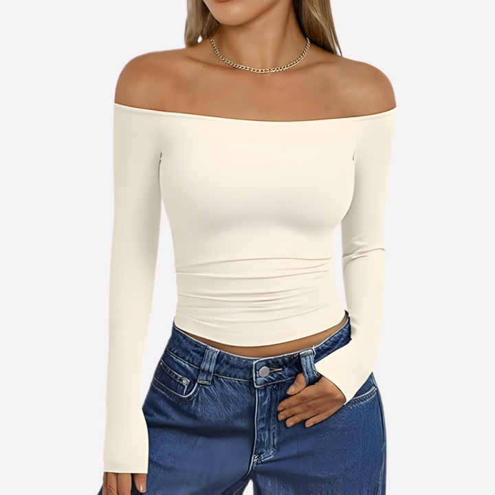 Stylish off-shoulder long sleeve top for women, elegant design, versatile fashion apparel.
