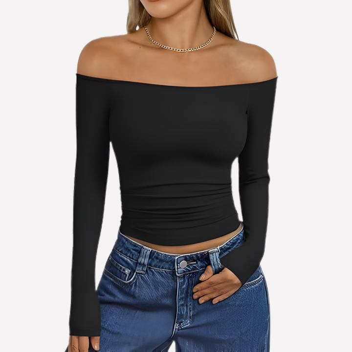 Chic women's off-the-shoulder long sleeve top, ideal for evening style or smart casual look.