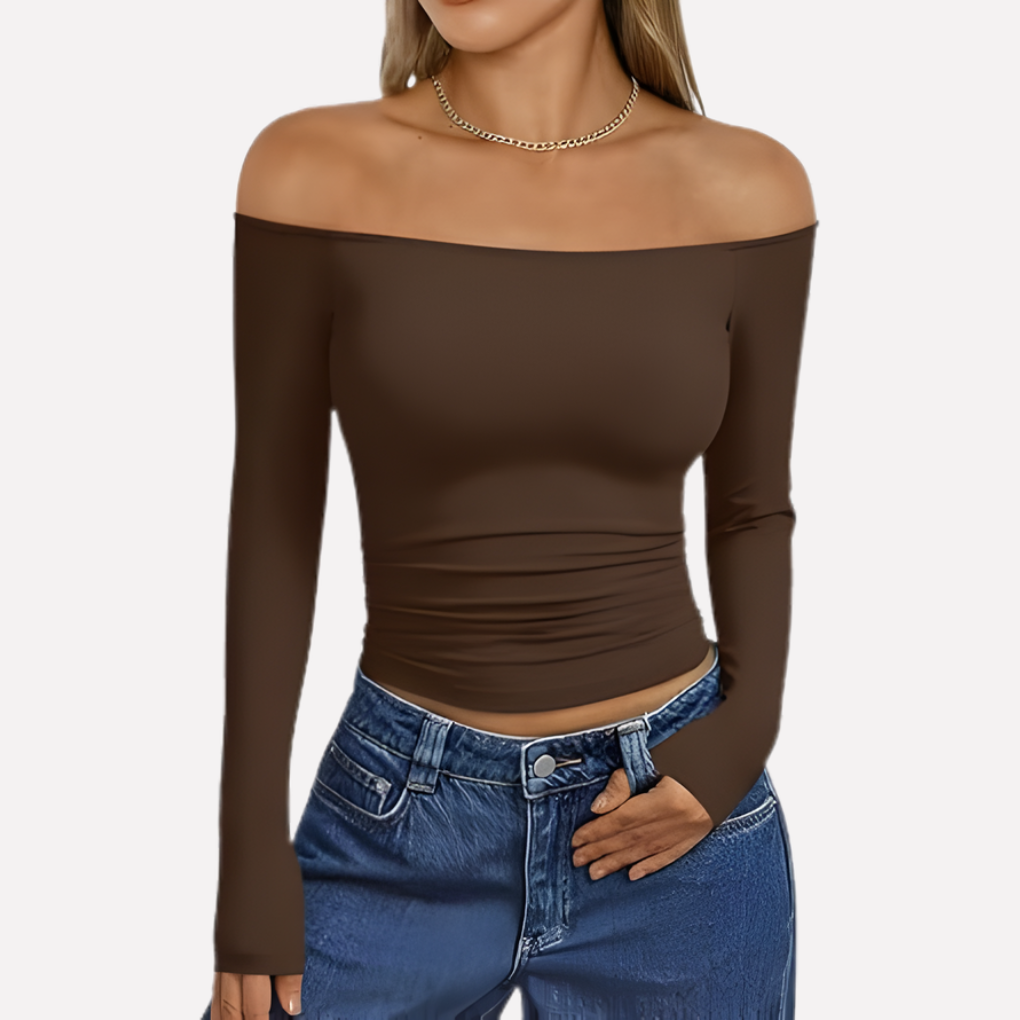 Fashionable women's off-the-shoulder long sleeve top, flattering design, modern apparel.