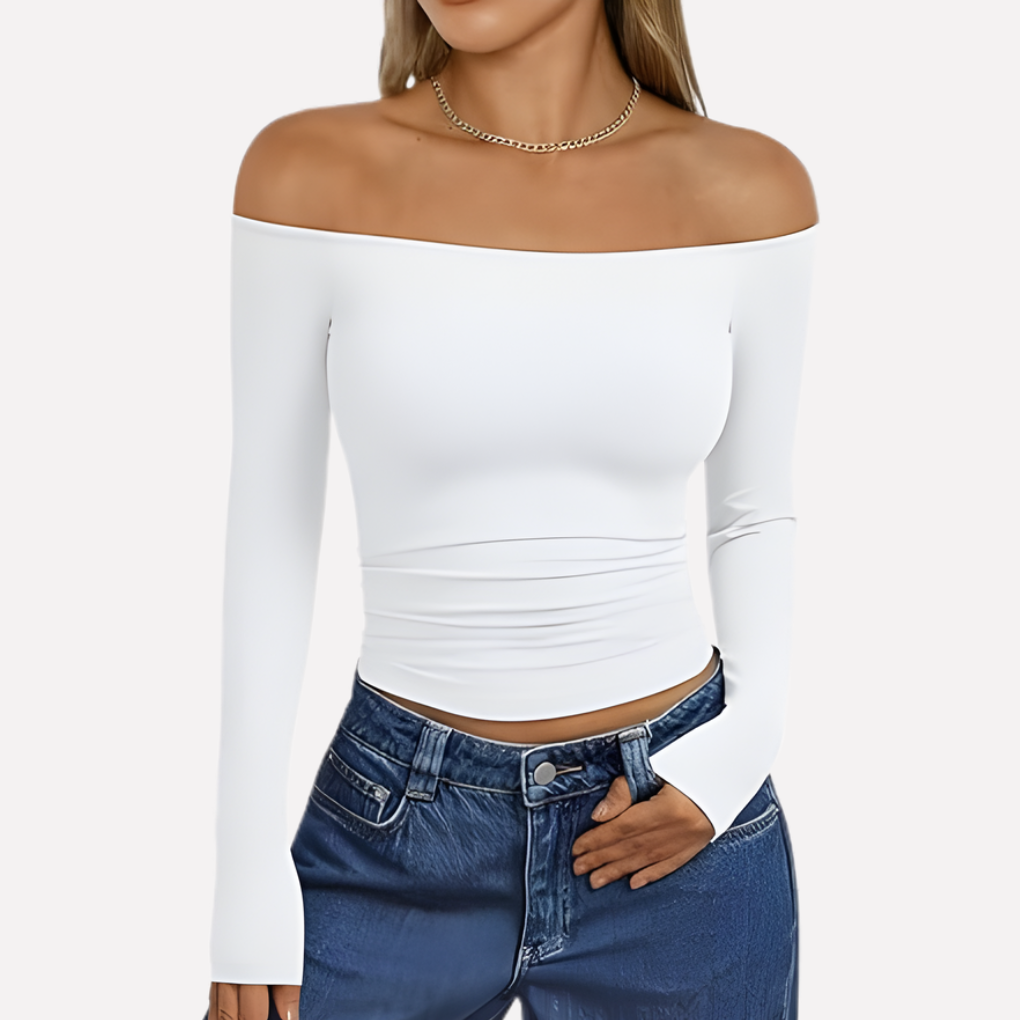 White women's off-the-shoulder long sleeve top, versatile for day or evening style.