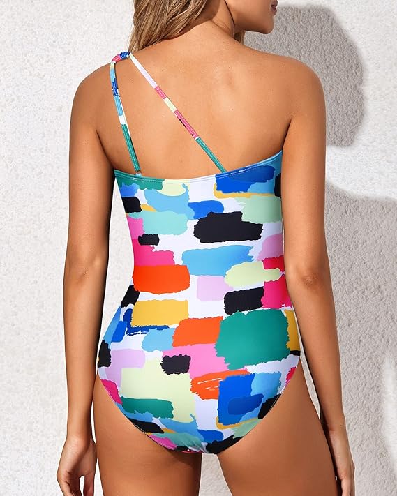 Confident women's one-shoulder tummy control swimsuit, designed for ultimate comfort and flattering style.