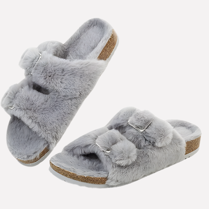 Women's open toe relaxation slippers. Cozy slide-on footwear for ultimate comfort at home.