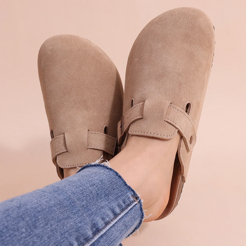 Cozy women's orthopedic slippers with arch support. Soft, breathable comfort for indoor wear & pain relief.