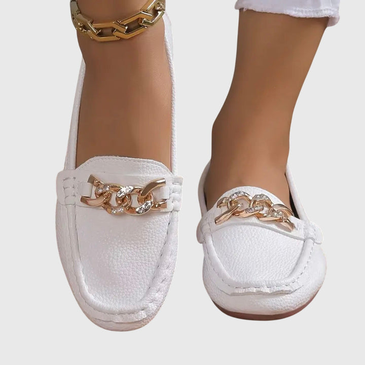 Women's orthopedic loafers in classic style, offering supportive arch comfort and casual elegance for everyday wear.