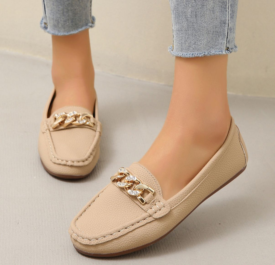 Stylish women's slip-on loafers with orthopedic arch support, perfect for foot health and elegant casual outfits.