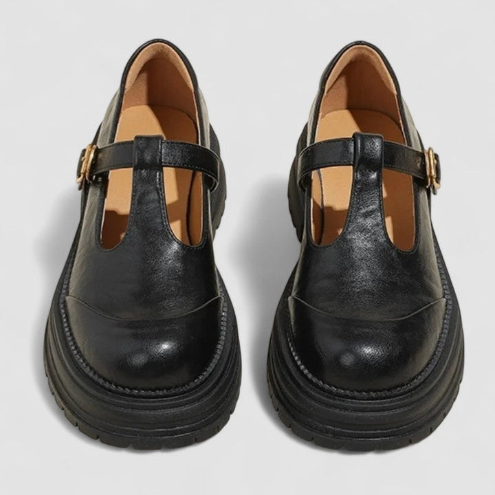 Comfortable women's Mary Jane flats with adjustable strap, ideal for walking and supportive everyday wear.