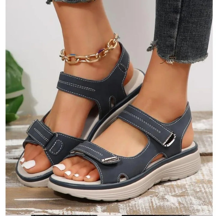 Stylish women's orthopedic summer sandals with arch support & adjustable straps for versatile daily wear.