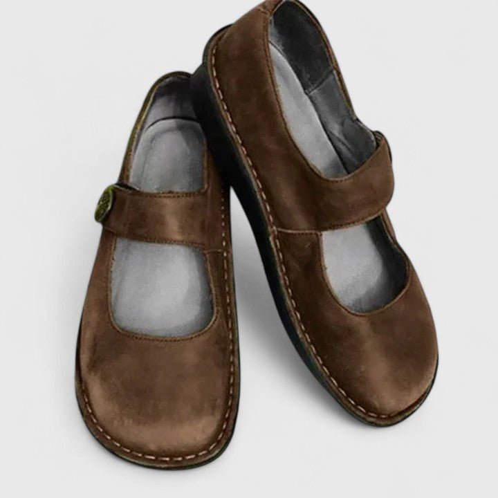 Supportive women's walking shoes with arch support for pain relief.