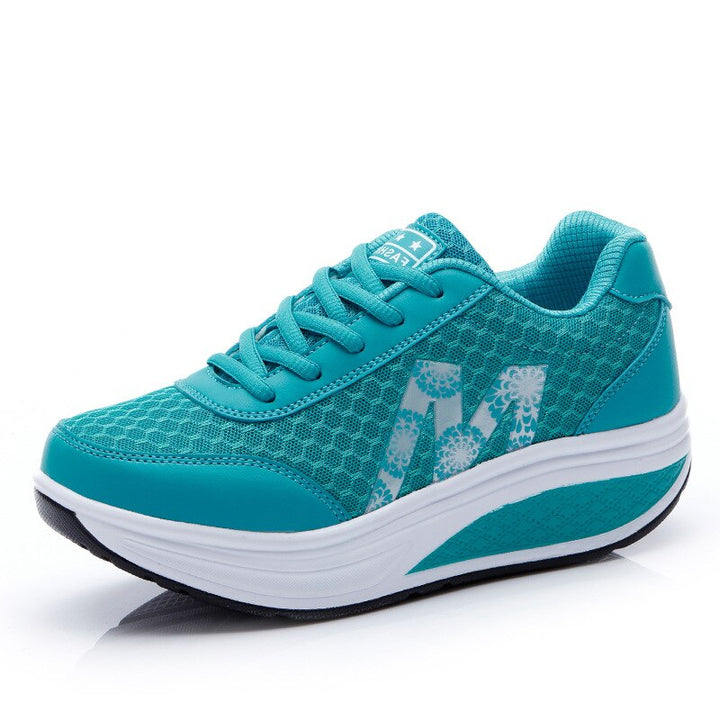 Side view of women's orthopedic sneakers providing pain relief & posture support. Great casual walking shoes.