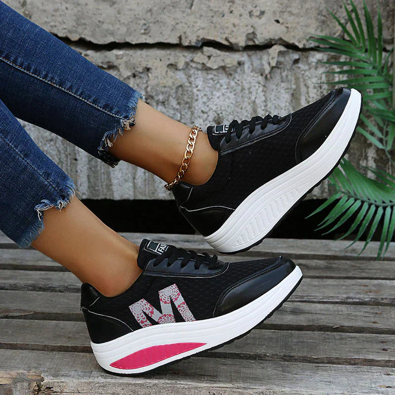 Rear view of women's orthopedic walking sneakers, providing stable comfort & support for an active lifestyle.