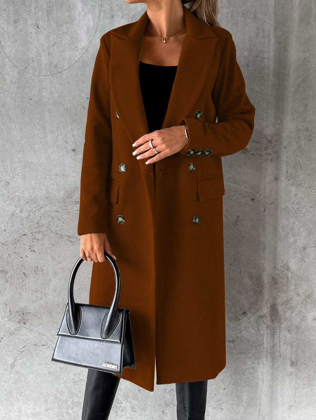 Women's oversize long winter jacket in urban style. Loose fit, chic outerwear for everyday fashion.