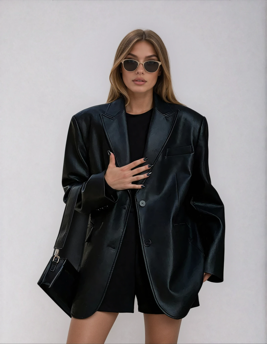 Women's oversized blazer with a wide lapel, exuding confident style. A chic and versatile jacket for any season.
