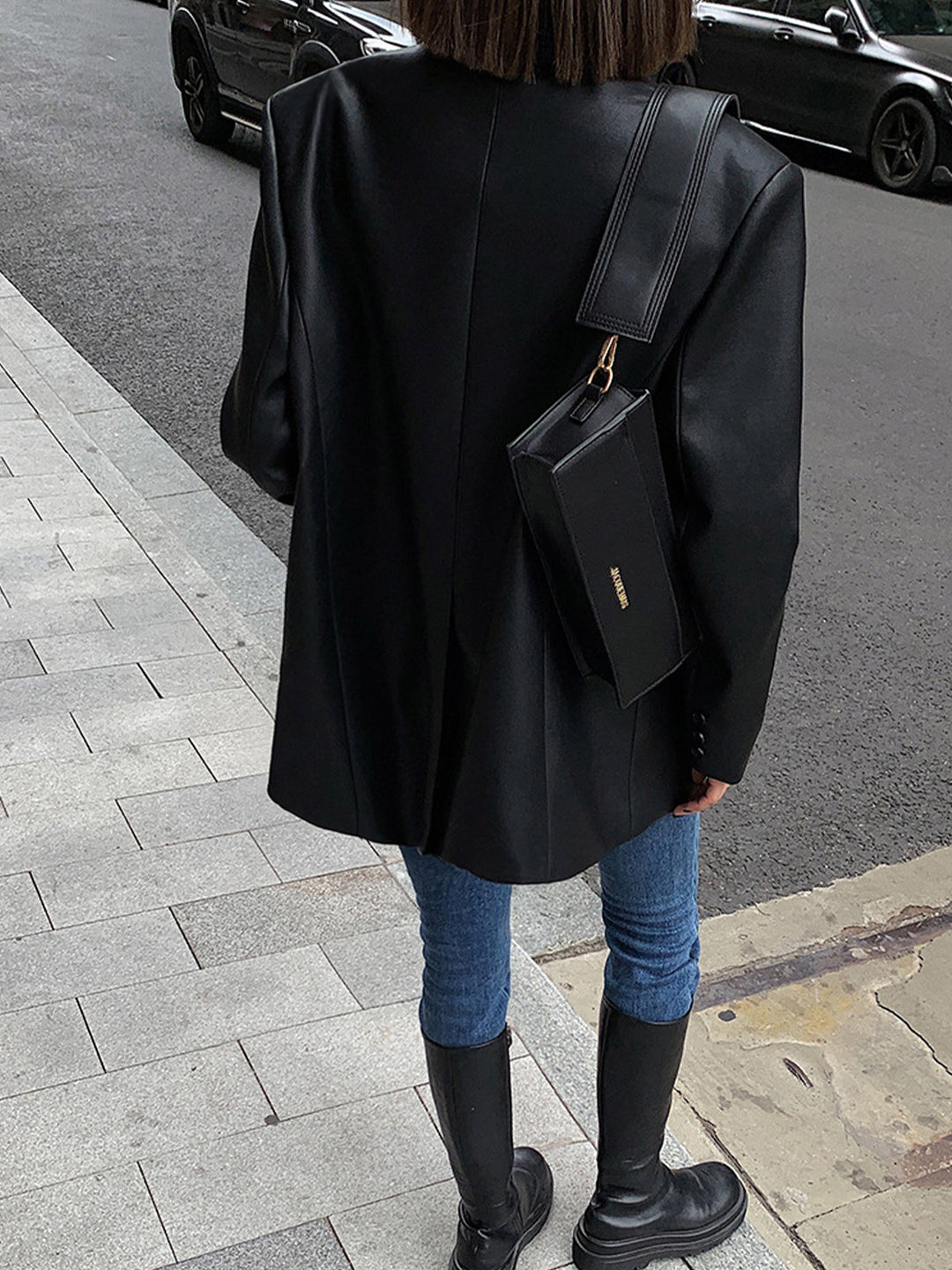 Chic women's oversized blazer with a stylish lapel collar. Perfect versatile outerwear for autumn & winter fashion.