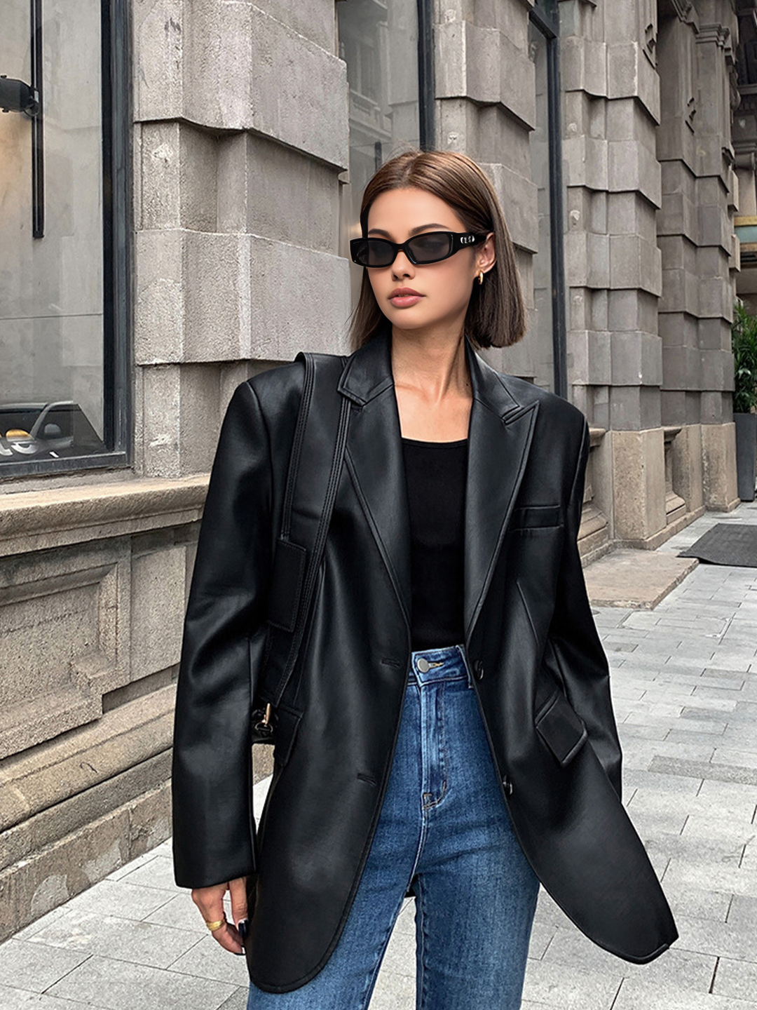 Women's oversized blazer with lapel collar. A versatile, chic jacket perfect for confident autumn & winter fashion.