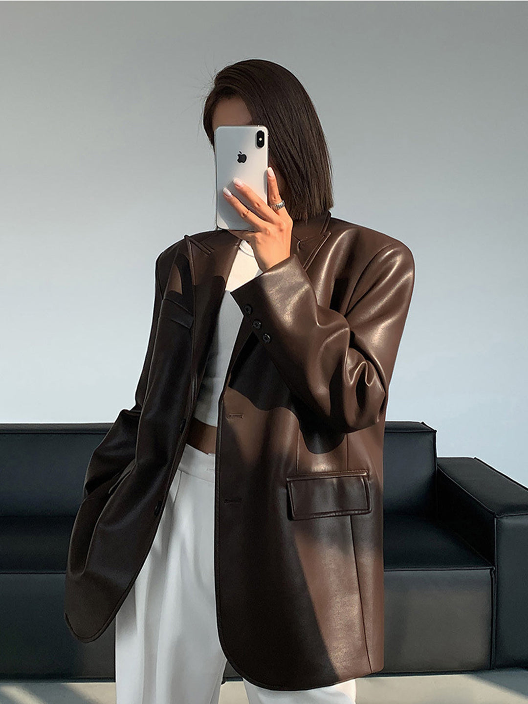 Statement women's oversized blazer with a lapel. Embrace confident style with this chic, versatile autumn jacket.