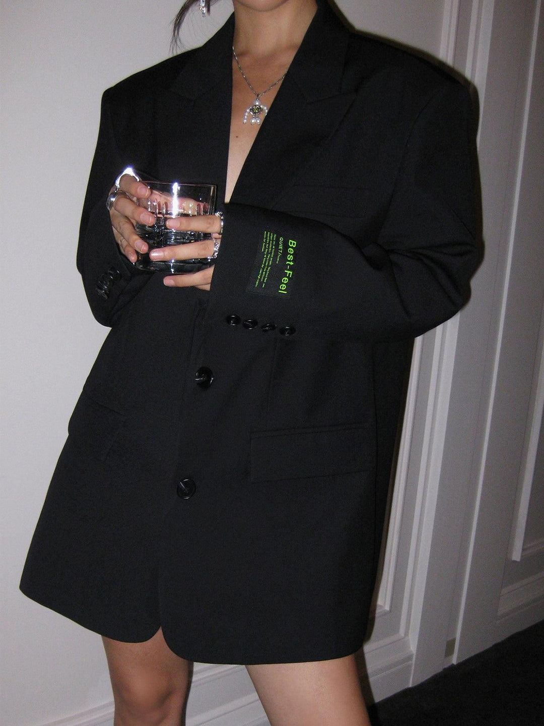 Chic women's oversized black blazer coat, blending classic style with modern tailoring for versatile outerwear.