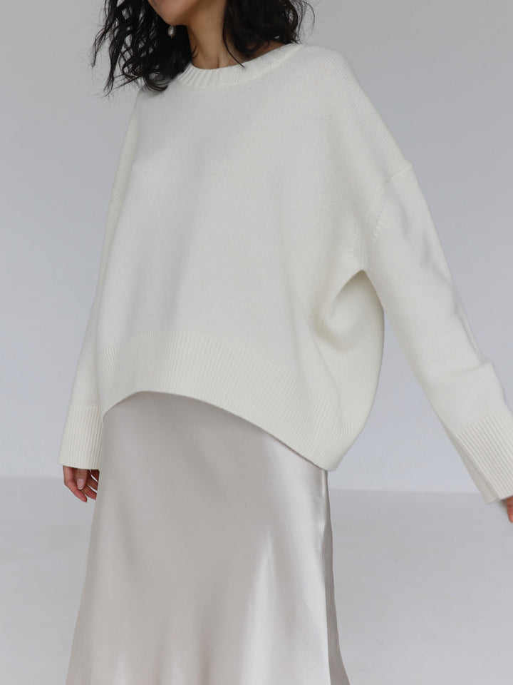 Women's cozy oversized crewneck sweater. Relaxed fit knit, long sleeve, perfect for fall and winter style.