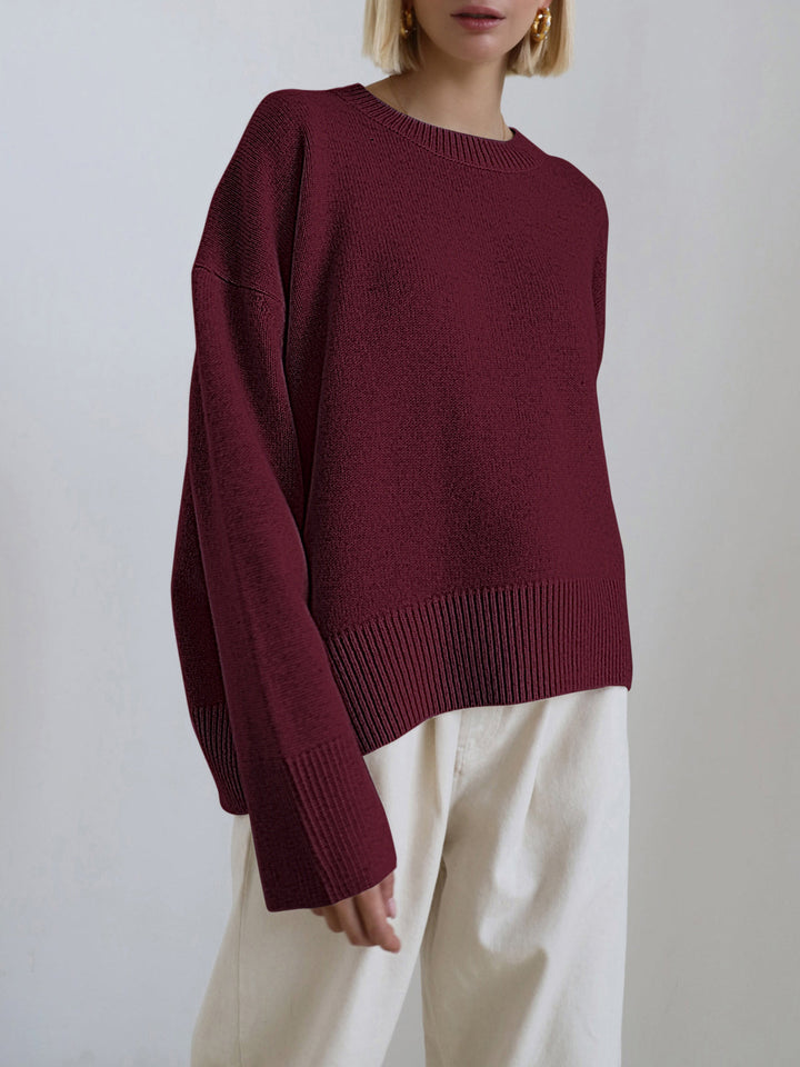 Versatile women's oversized crewneck knit sweater. Casual top, comfy layering piece for everyday wear.