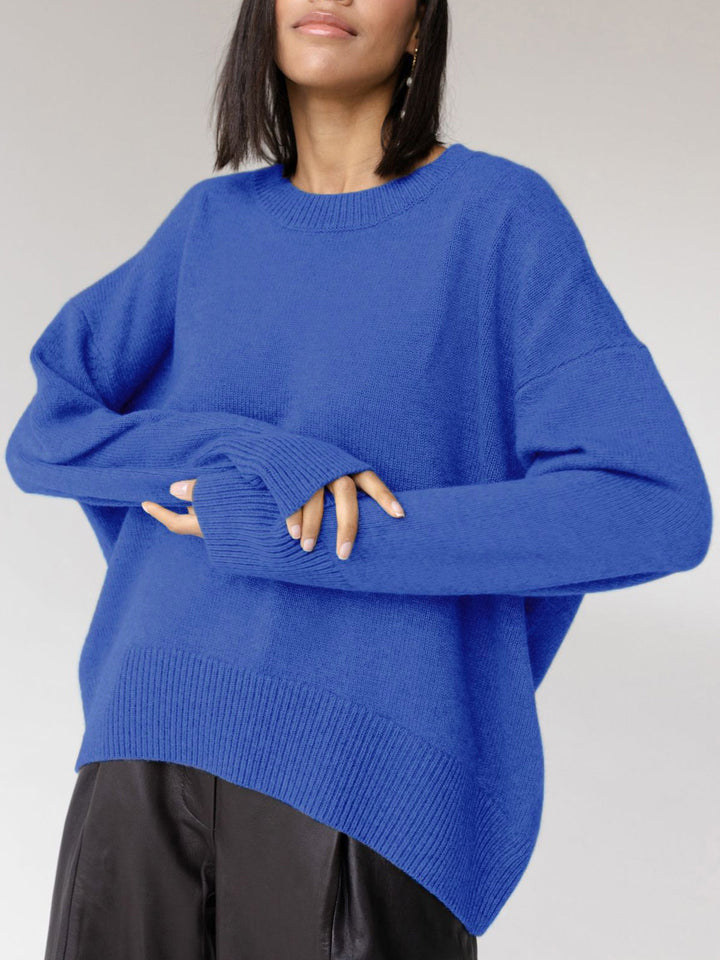 Navy women's oversized crewneck knit sweater. Relaxed fit, long sleeve, cozy winter style & fall fashion.