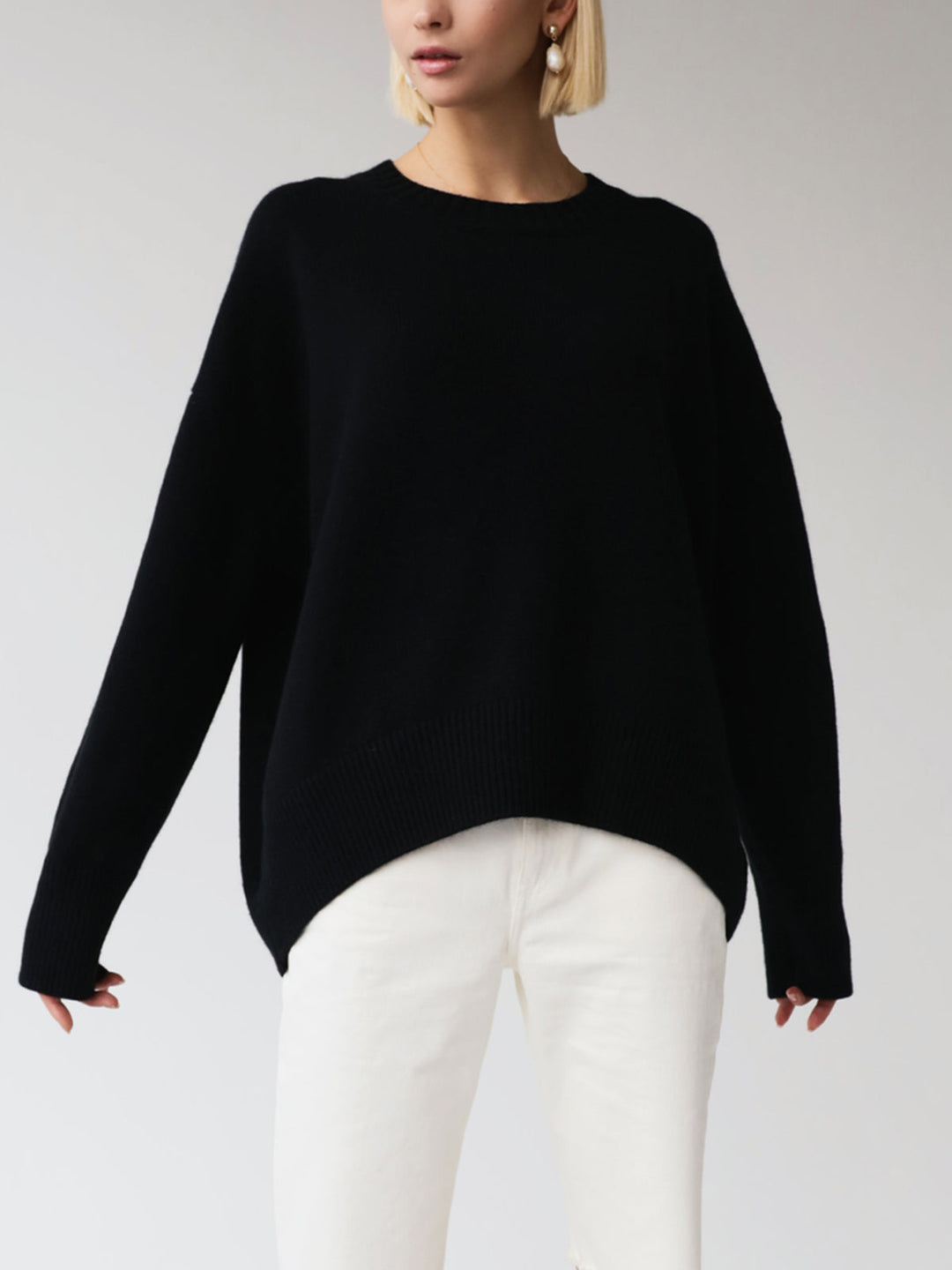 Textured oversized crewneck knit sweater for women. Cozy, relaxed fit, long sleeve casual top.
