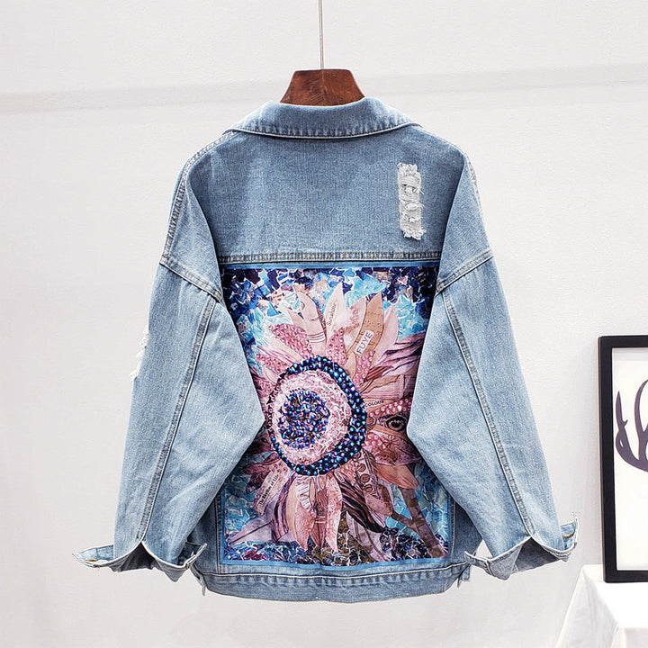 Women's oversized denim jacket with unique graphic back print, perfect for casual streetwear & trendy fall fashion.