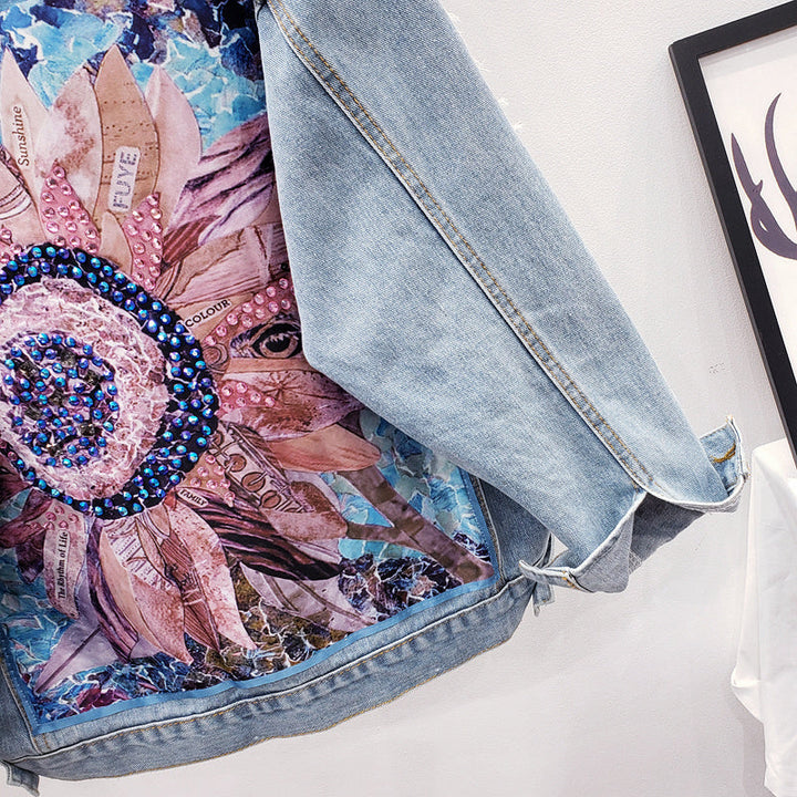 Oversized women's denim jacket 'Lynn' with eye-catching back print, a stylish choice for spring & fall outerwear.