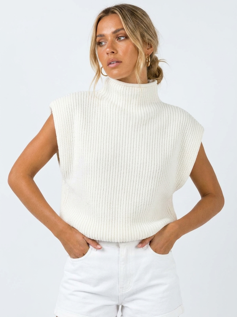 Women's oversized high neck knitted vest. Perfect for effortless layering, casual fall fashion & modern winter styles.