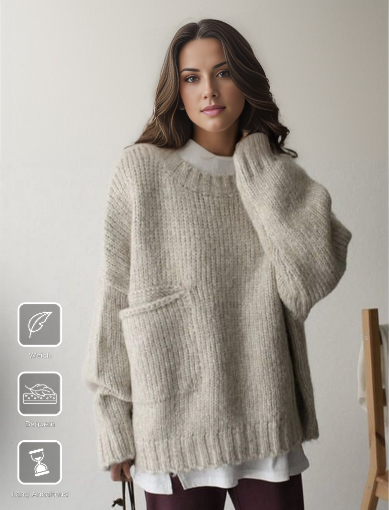 Women's oversized knitted jumper, providing cozy autumn comfort and relaxed fit style.