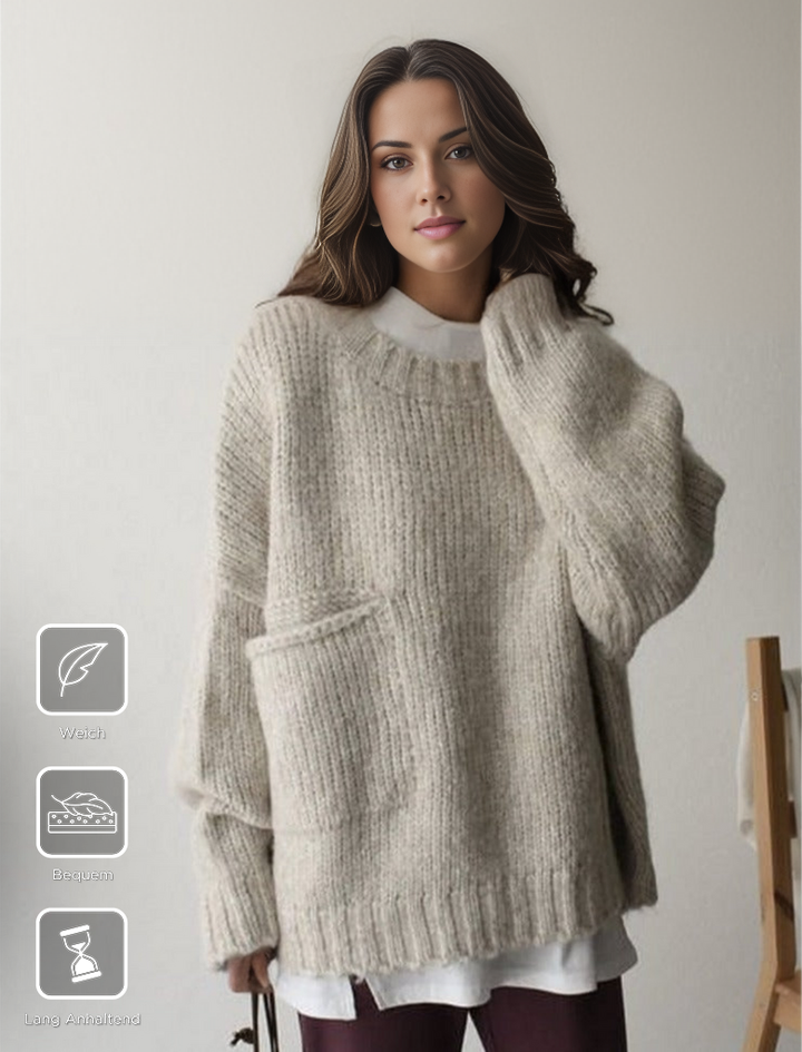 Women's oversized knitted jumper, providing cozy autumn comfort and relaxed fit style.