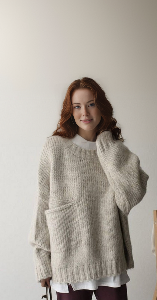High-quality women's oversized knitted jumper, ensuring cozy autumn comfort and lasting style.