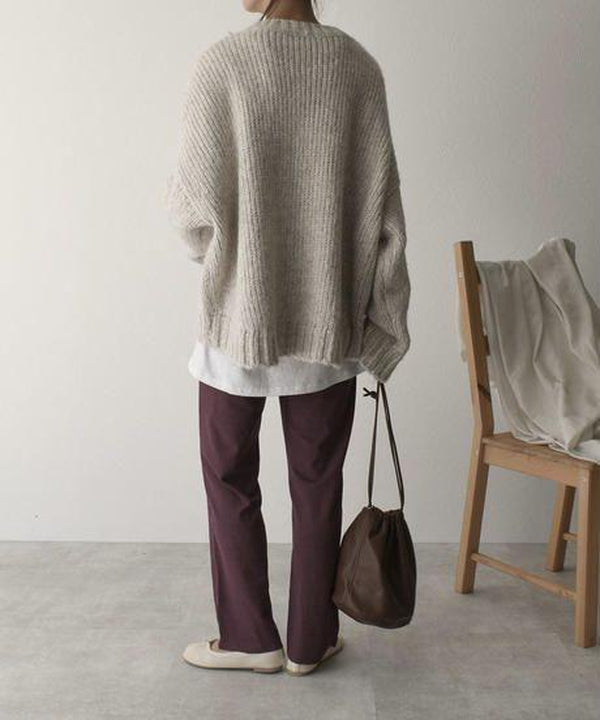 Cozy long sleeve women's oversized knitted jumper, ideal for ultimate autumn comfort and layering.