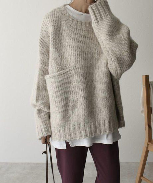 Soft knitted women's oversized jumper, offering warm and stylish comfort for cool weather.