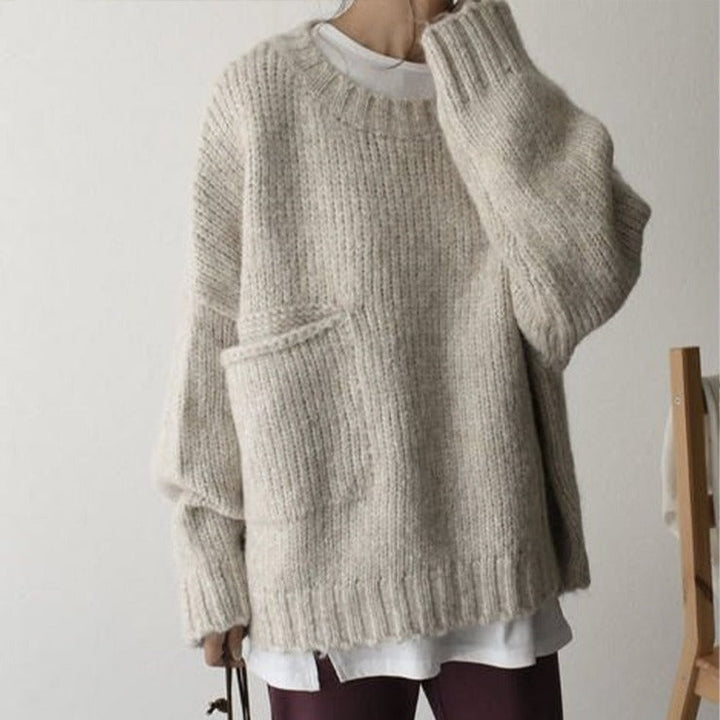 Autumn style women's oversized jumper, a comfortable long sleeve top for everyday wear.