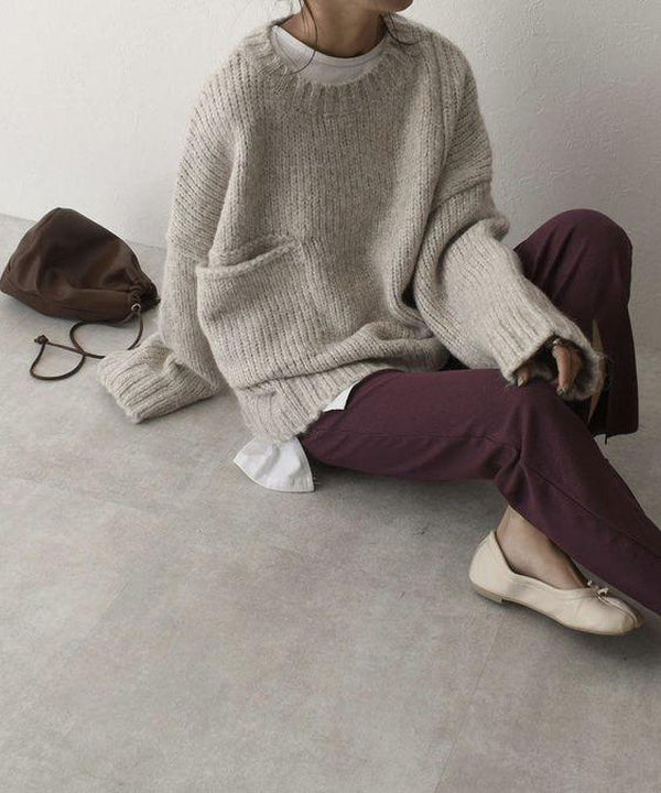 Warm women's oversized knitted jumper, excellent for winter wear and ultimate comfort.