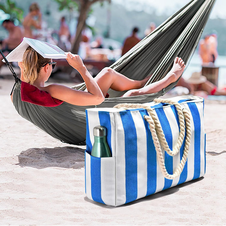 Women's oversized waterproof travel tote, sandproof, an essential for any destination.