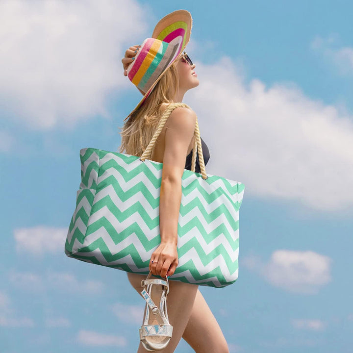 Lightweight yet durable women's oversized waterproof beach tote, sandproof for easy transport.