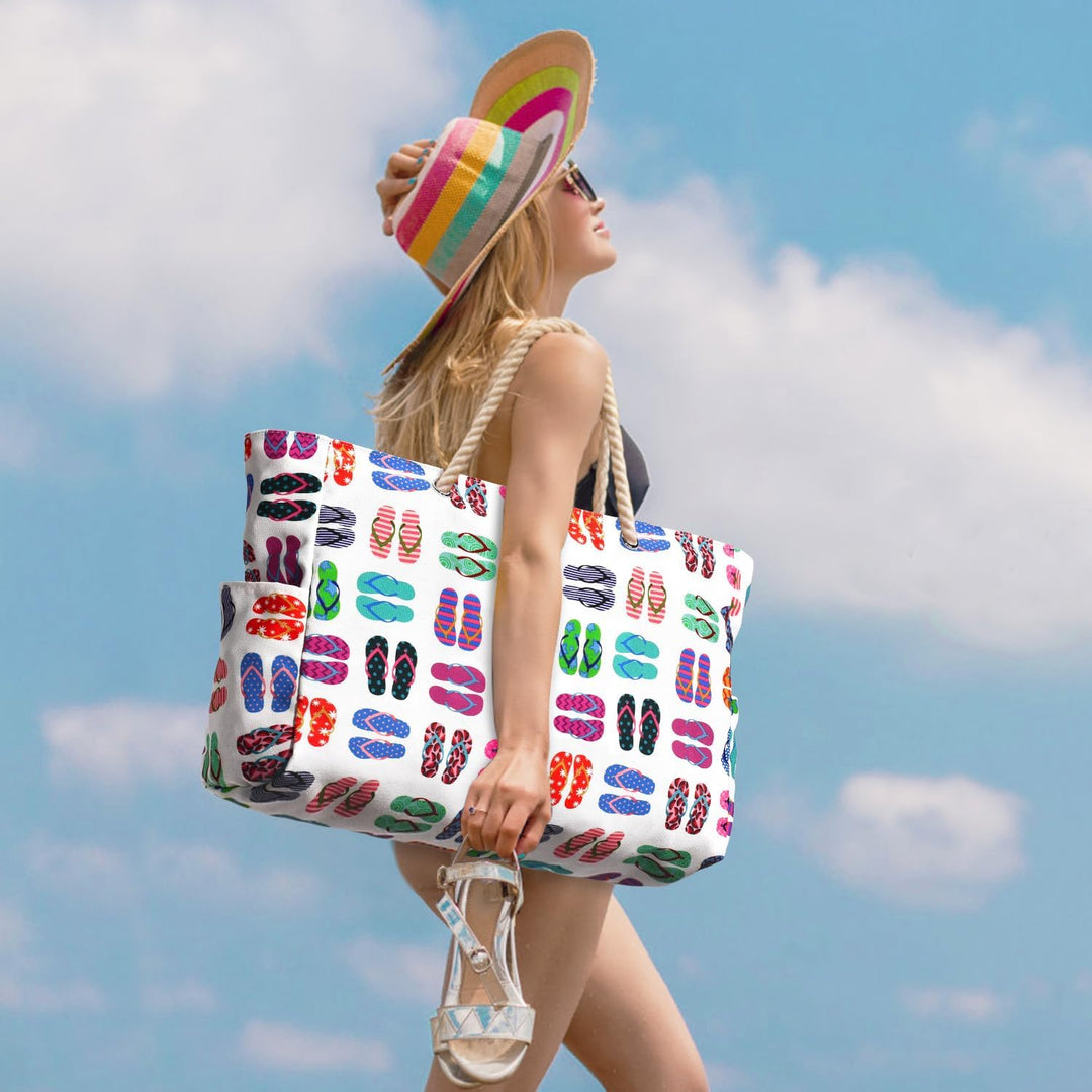 Women's oversized waterproof beach tote, sandproof, with visible sturdy handles.