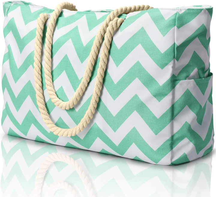 Closeup of fabric: Waterproof & sandproof material on a women's oversized beach tote bag.
