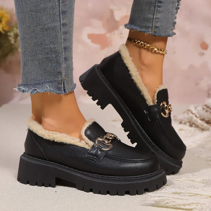 Comfortable women's platform loafers, versatile slip-on design for casual and everyday style.