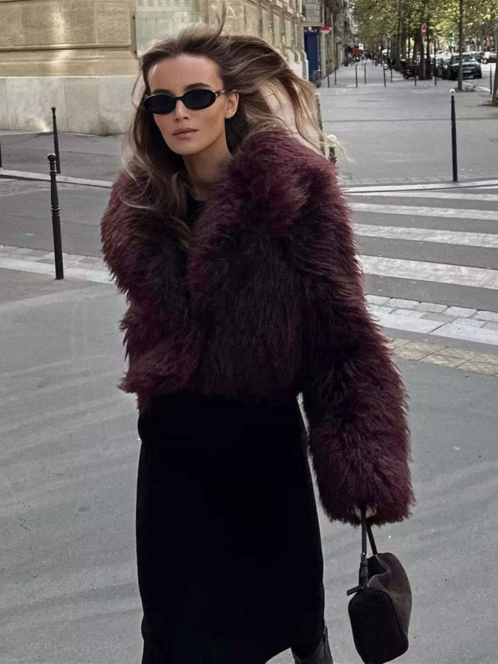 Chic women's cropped plush jacket, a versatile burgundy outerwear piece for fashionable winter and evening looks.
