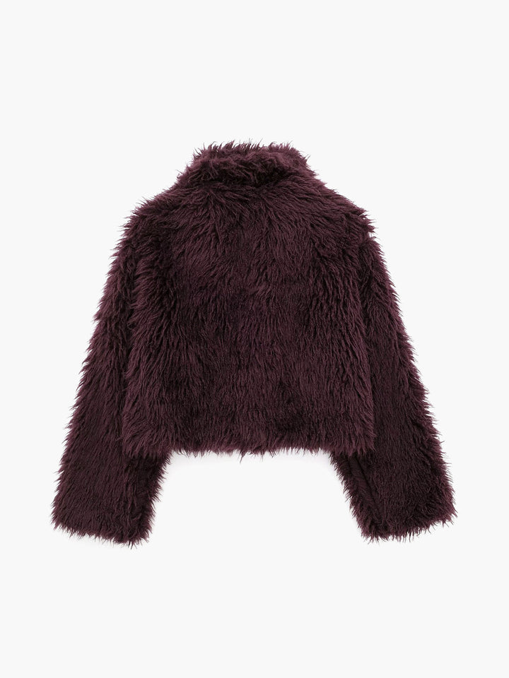 Trendy women's plush cropped burgundy jacket, a soft and stylish statement piece for modern winter fashion.