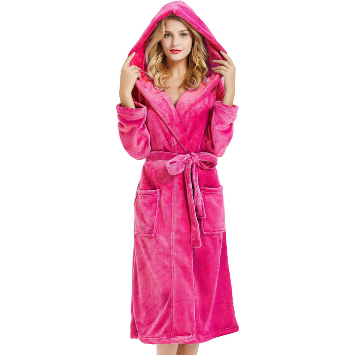 Warm women's hooded bathrobe in plush fleece, comfort for winter evenings.